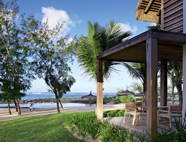 View of the beach and exterior at Long Beach Resort Golf & Spa in Mauritius.